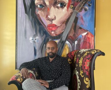 black man in art gallery