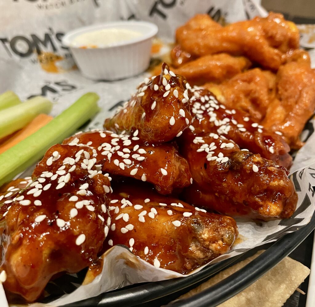 Buffalo wings and Korean BBQ wings a Tom's Watch bar